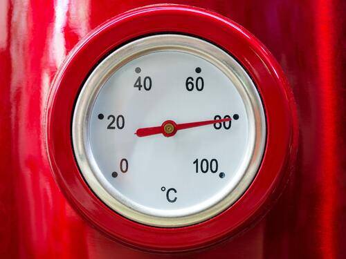 grilling on a charcoal grill picture of red temperature gauge